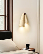 Draped Elegance Travertine Sconce