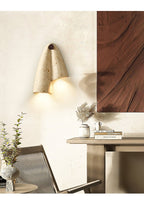 Draped Elegance Travertine Sconce