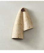 Draped Elegance Travertine Sconce