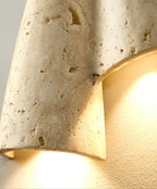 Draped Elegance Travertine Sconce